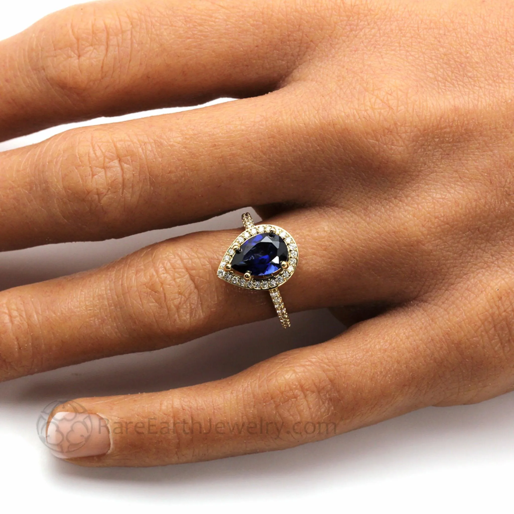 Large Pear Cut Blue Sapphire Engagement Ring Pave Diamond Halo