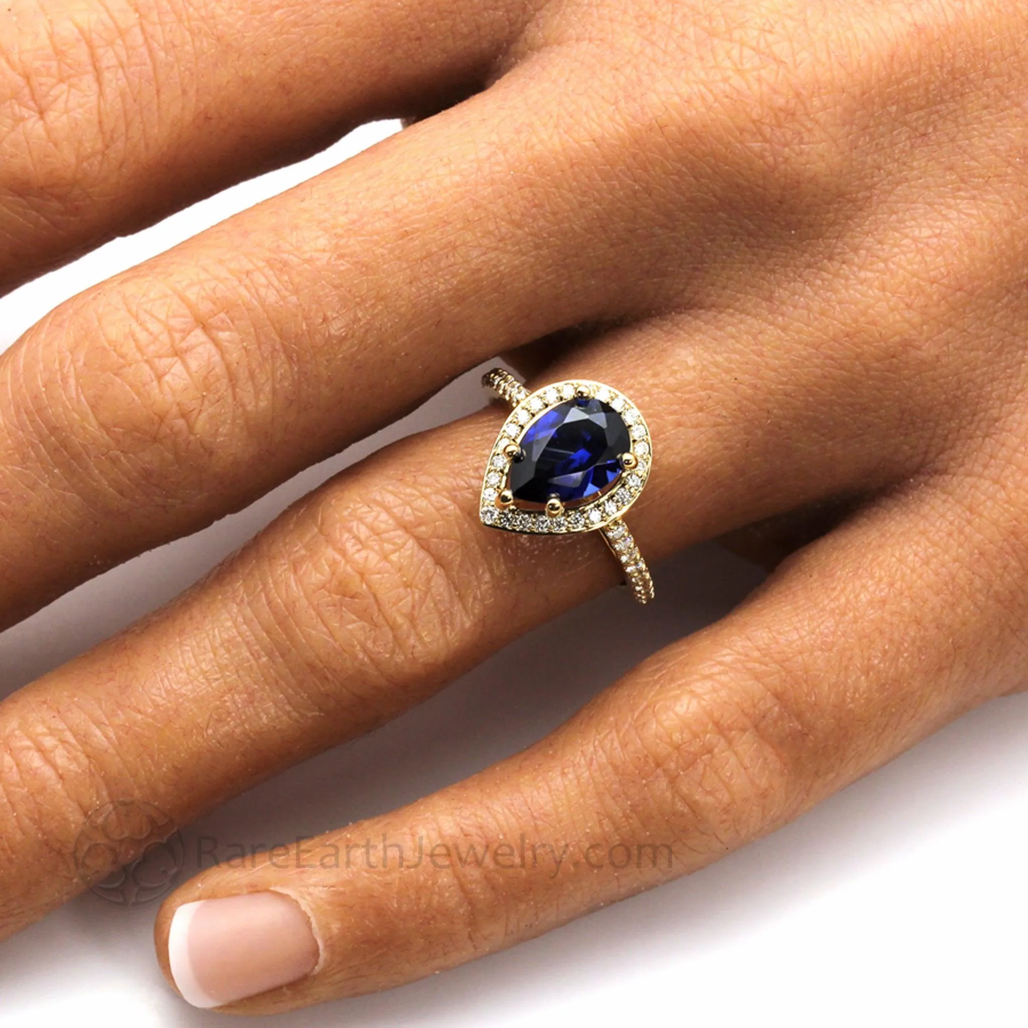 Large Pear Cut Blue Sapphire Engagement Ring Pave Diamond Halo